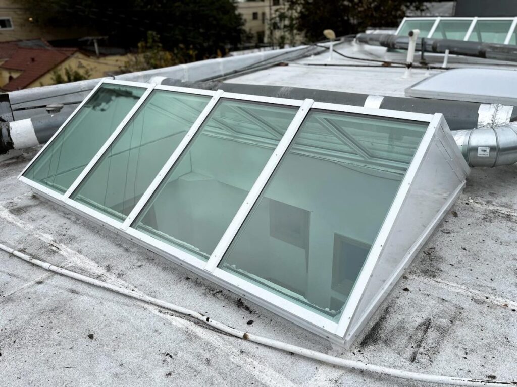 Commercial Flat Glass Skylight White Frame Urban Roof West Hollywood