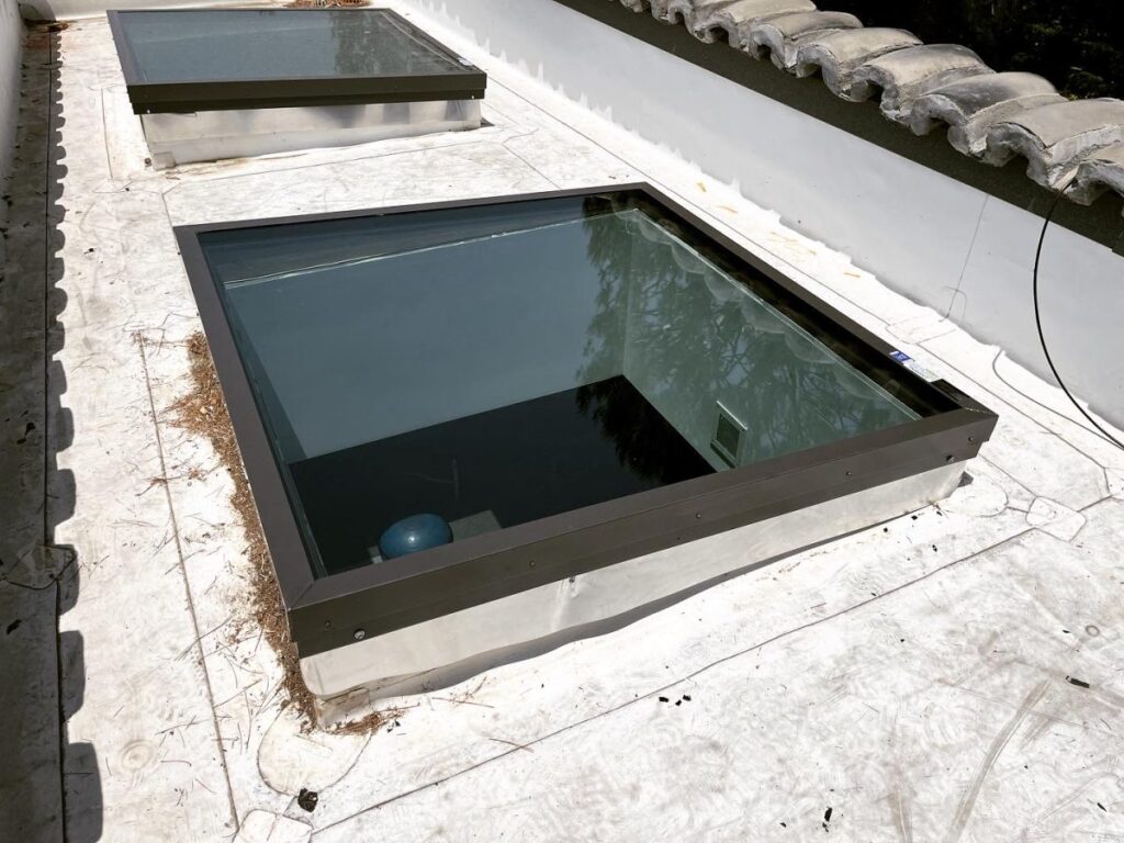 Flat Glass Skylight Clay Tile Roof Installation Los Angeles